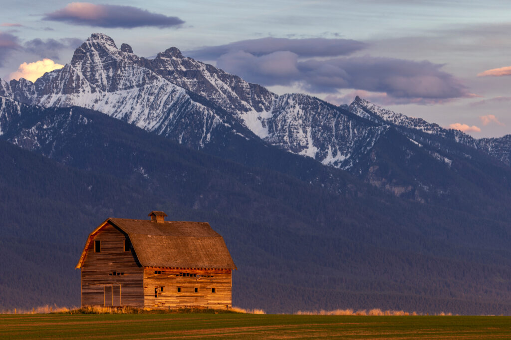 Old Barn in front of Mountains